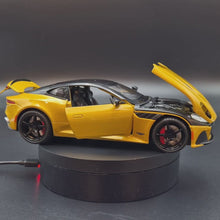 Load and play video in Gallery viewer, Explorafind 2023 Aston Martin DBS Coupe Yellow 1:24 Die Cast Car