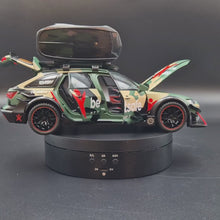Load and play video in Gallery viewer, Explorafind 2021 Audi RS6 Wagon Green Camouflage 1:24 Die Cast Car
