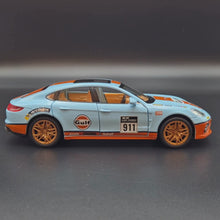 Load and play video in Gallery viewer, Explorafind 2019 Porsche Panamera S Gulf Blue 1:24 Die Cast Car