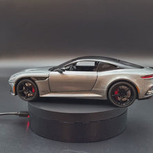 Load and play video in Gallery viewer, Explorafind 2023 Aston Martin DBS Coupe Grey 1:24 Die Cast Car
