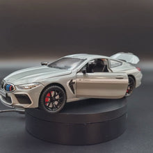 Load and play video in Gallery viewer, Explorafind 2023 BMW M8 Manhart MH8 800 Grey 1:24 Die Cast Car
