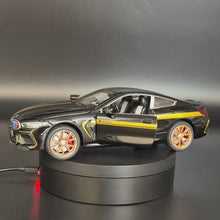Load and play video in Gallery viewer, Explorafind 2023 BMW M8 Manhart MH8 800 Black 1:24 Die Cast Car