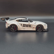 Load and play video in Gallery viewer, Explorafind 2023 Toyota Supra GT4 White 1:24 Die Cast Race Car
