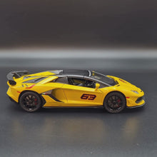 Load and play video in Gallery viewer, Explorafind 2023 Lamborghini Aventador SVJ 63 Yellow 1:24 Die Cast Car