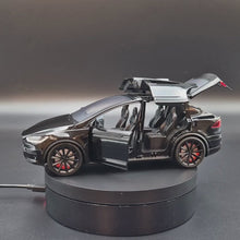 Load and play video in Gallery viewer, Explorafind 2020 Tesla Model X Black 1:24 Die Cast Car