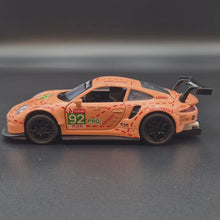 Load and play video in Gallery viewer, Explorafind 2019 Porsche 911 RSR Pink 1:32 Die Cast Race Car