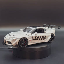 Load and play video in Gallery viewer, Explorafind 2023 Toyota Supra GT4 White 1:24 Die Cast Race Car