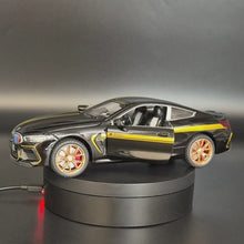 Load and play video in Gallery viewer, Explorafind 2023 BMW M8 Manhart MH8 800 Black 1:24 Die Cast Car

