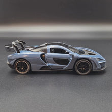 Load and play video in Gallery viewer, Explorafind 2019 McLaren Senna Blue/Grey 1:32 Die Cast Car