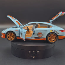 Load and play video in Gallery viewer, Explorafind 2019 Porsche Panamera S Gulf Blue 1:24 Die Cast Car