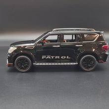 Load and play video in Gallery viewer, Explorafind 2023 Nissan Patrol Black 1:24 Die Cast Car