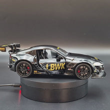 Load and play video in Gallery viewer, Explorafind 2023 Toyota Supra GT4 Black 1:24 Die Cast Race Car