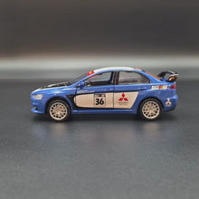 Load and play video in Gallery viewer, Explorafind 2015 Mitsubishi Lancer Evolution Blue 1:32 Die Cast Car
