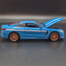 Load and play video in Gallery viewer, Explorafind 2023 BMW M8 Manhart MH8 800 Blue 1:32 Die Cast Car
