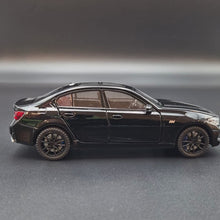 Load and play video in Gallery viewer, Explorafind 2023 BMW 3 Series 320i Black 1:32 Die Cast Car
