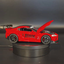 Load and play video in Gallery viewer, Explorafind 2023 Toyota Supra GT4 Red 1:24 Die Cast Race Car