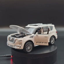 Load and play video in Gallery viewer, Explorafind 2023 Nissan Patrol White 1:32 Die Cast Car
