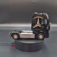 Load and play video in Gallery viewer, Explorafind 2023 Mercedes-Benz Actros 1851 Truck Black 1:24 Die Cast Truck
