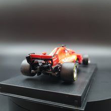 Load image into Gallery viewer, Bburago 2018 Ferrari Formula 1 SF71H Kimi Raikkonen #7 1:43
