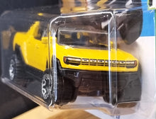 Load image into Gallery viewer, Hot Wheels 2022 GMC Hummer EV Yellow #130 HW Green Speed 3/5 New
