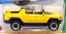 Load image into Gallery viewer, Hot Wheels 2022 GMC Hummer EV Yellow #130 HW Green Speed 3/5 New Long Card
