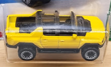 Load image into Gallery viewer, Hot Wheels 2022 GMC Hummer EV Yellow #130 HW Green Speed 3/5 New Long Card
