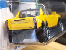 Load image into Gallery viewer, Hot Wheels 2022 GMC Hummer EV Yellow #130 HW Green Speed 3/5 New Long Card
