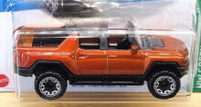 Load image into Gallery viewer, Hot Wheels 2022 GMC Hummer EV Tintcoat #130 HW Green Speed 3/5 New Long Card
