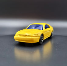 Load image into Gallery viewer, Maisto &#39;99 Ford Mustang Yellow Limited Edition Motor Works #124 Scale 1:64
