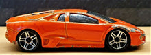 Load image into Gallery viewer, Hot Wheels 2010 Lamborghini Reventón Orange #71 HW Garage 3/10
