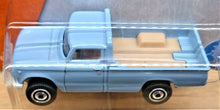 Load image into Gallery viewer, Matchbox 2017 &#39;62 Nissan Junior Light Blue #7 MBX Adventure City New Long Card

