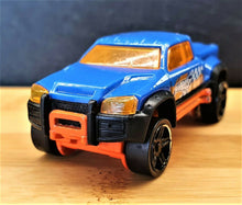 Load image into Gallery viewer, Hot Wheels 2012 Mega Duty Blue Auto Motion Speedway Pack Loose
