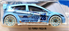Load image into Gallery viewer, Hot Wheels 2016 &#39;12 FORD FIESTA Light Blue #157 HW SNOW STORMERS 2/5 New
